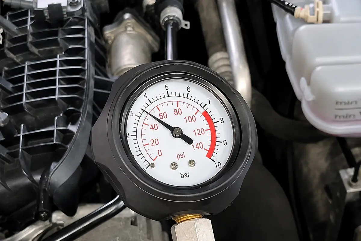 Mechanical oil pressure gauge connected to an EA888 engine during a pressure test Mechanical oil pressure gauge connected to an EA888 engine during a pressure test