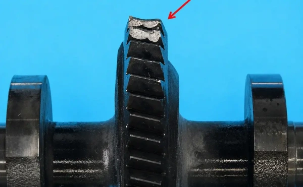 BMW N55 eccentric shaft worn gear teeth compared with normal gear BMW N55 eccentric shaft worn gear teeth compared with normal gear